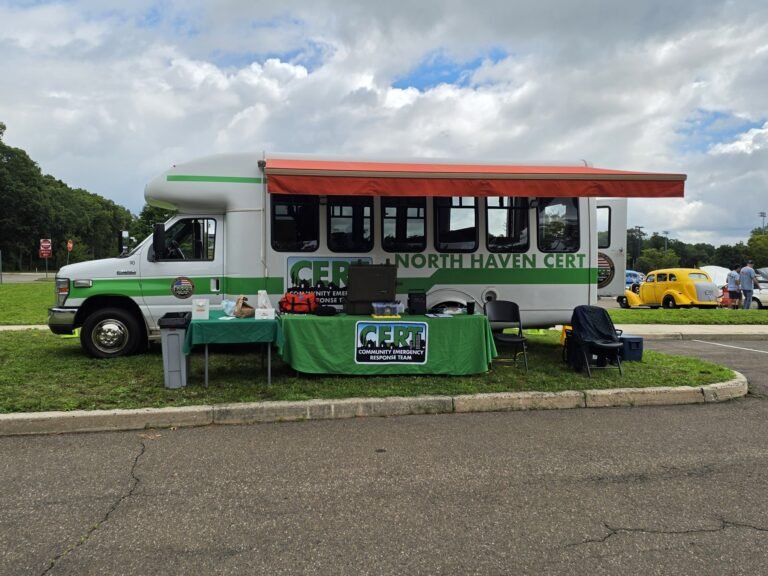 ERV-111 and Information Table beside the Car Show