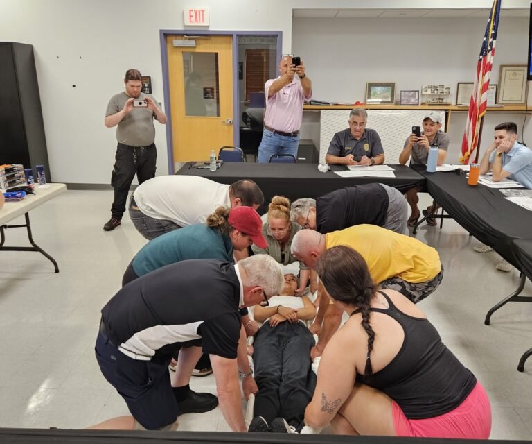 CERT Trainees Practicing CPR on a Manikin